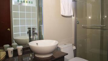 Shower, free toiletries, hair dryer, slippers