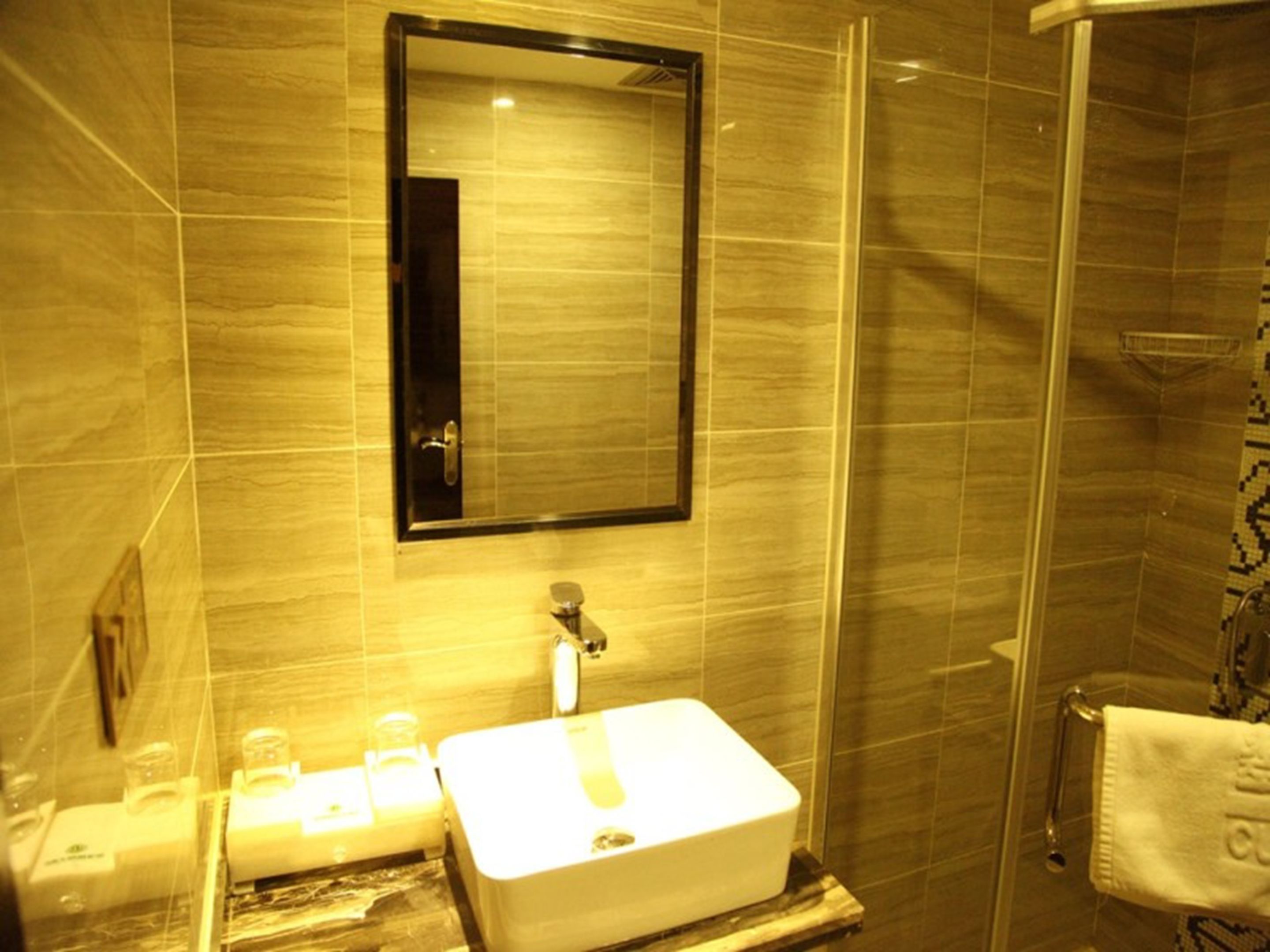 Shower, free toiletries, hair dryer, slippers