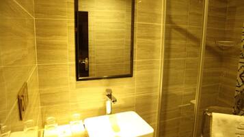 Shower, free toiletries, hair dryer, slippers