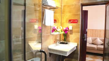 Shower, free toiletries, hair dryer, slippers