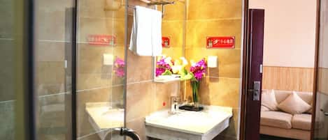 Shower, free toiletries, hair dryer, slippers