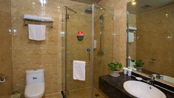 Shower, free toiletries, hair dryer, slippers