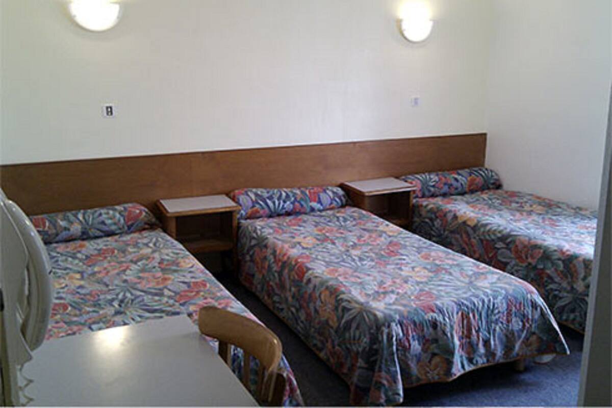 Premium bedding, blackout curtains, iron/ironing board, free WiFi