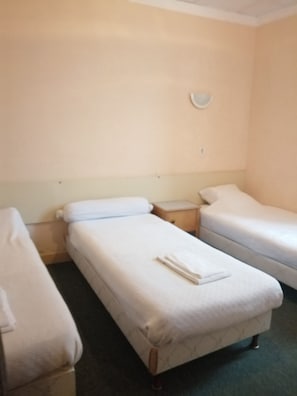 Premium bedding, blackout curtains, iron/ironing board, free WiFi