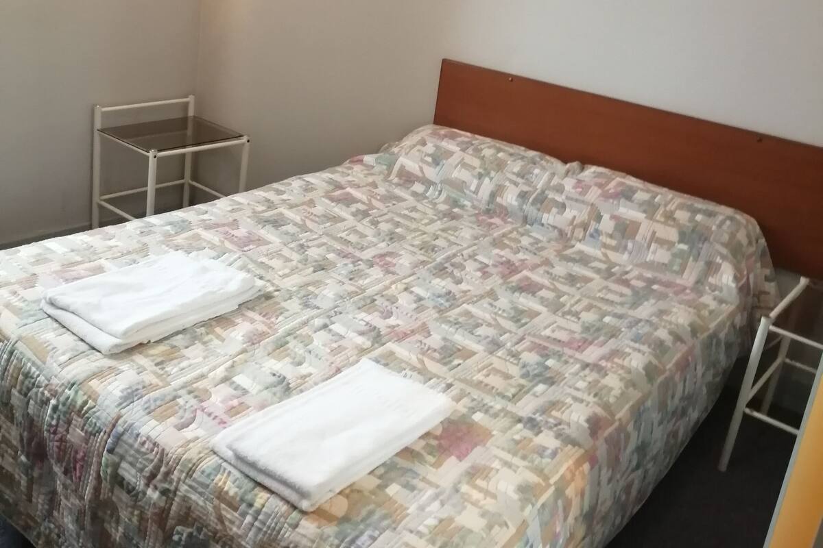 Premium bedding, blackout curtains, iron/ironing board, free WiFi