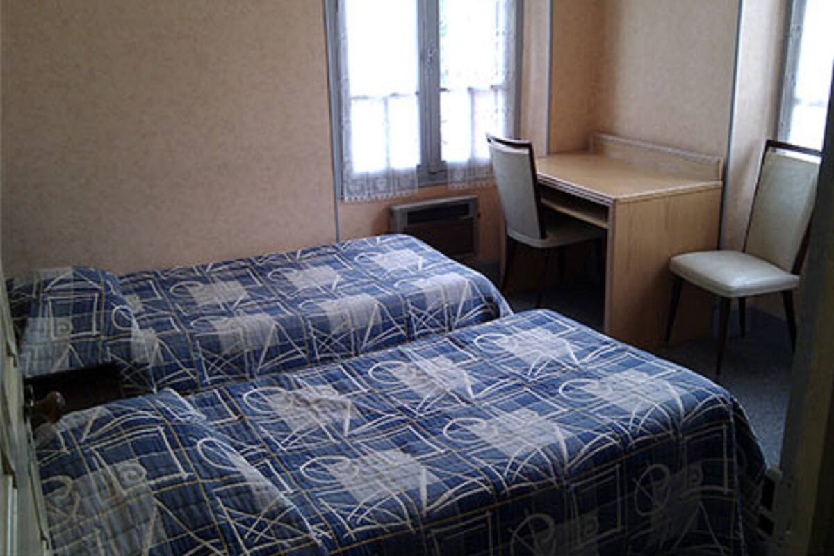 Premium bedding, blackout curtains, iron/ironing board, free WiFi