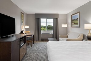 Deluxe Room, 1 King Bed with Sofa bed, Non Smoking | Desk, laptop workspace, blackout drapes, iron/ironing board - Little Crow Hotel & Conference, Trademark by Wyndham (New London)