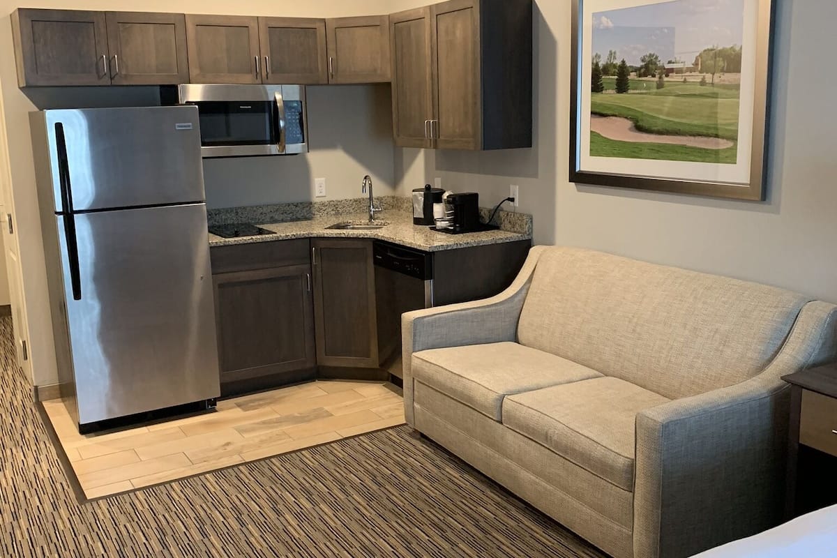 suite, 1 king bed with sofa bed (extended stay studio) | desk, laptop workspace, blackout curtains, iron/ironing board