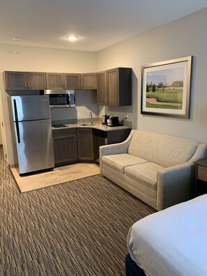Suite, 1 King Bed with Sofa bed (Extended Stay Studio) | Desk, laptop workspace, blackout curtains, iron/ironing board