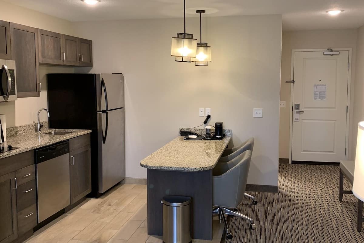 Desk, laptop workspace, blackout curtains, iron/ironing board