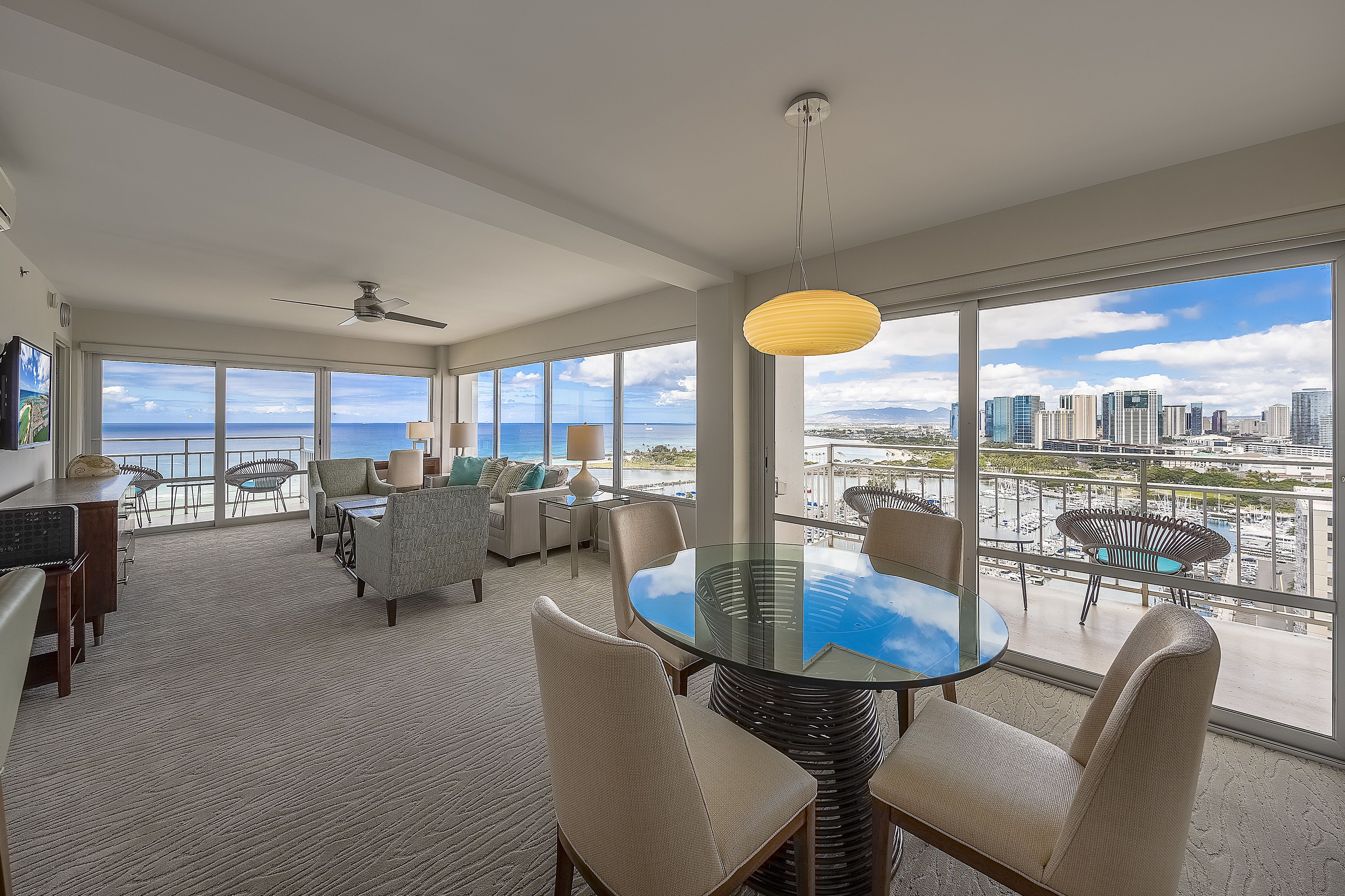 comfort room, multiple beds, ocean view, beachside (24262343) | living room | flat-screen tv