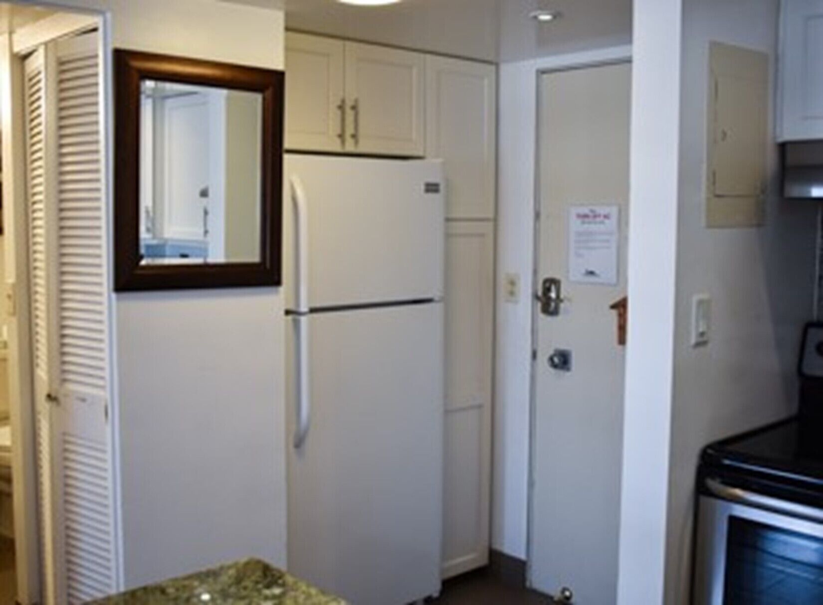 comfort room, 1 bedroom, lanai, city view | private kitchen | full-sized fridge, microwave, oven, stovetop