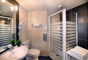 Shower, free toiletries, hair dryer, towels