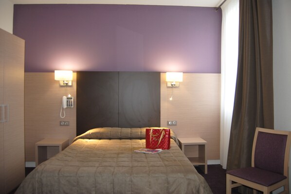 Individually decorated, individually furnished, desk, blackout curtains