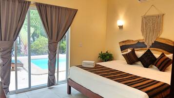 Family Apartment, 1 Bedroom, Pool View, Ground Floor | Individually decorated, individually furnished, desk, laptop workspace