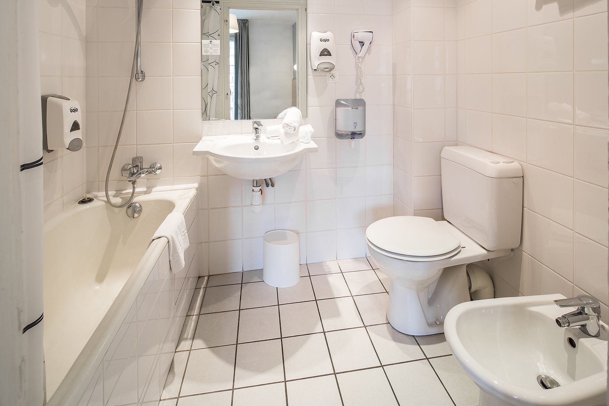 free toiletries, hair dryer, bidet, towels