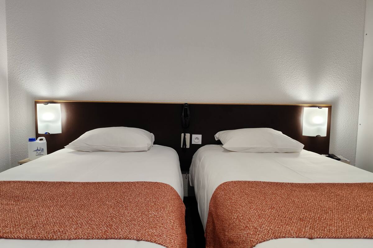 economy double room | desk, blackout curtains, soundproofing, free cots/infant beds