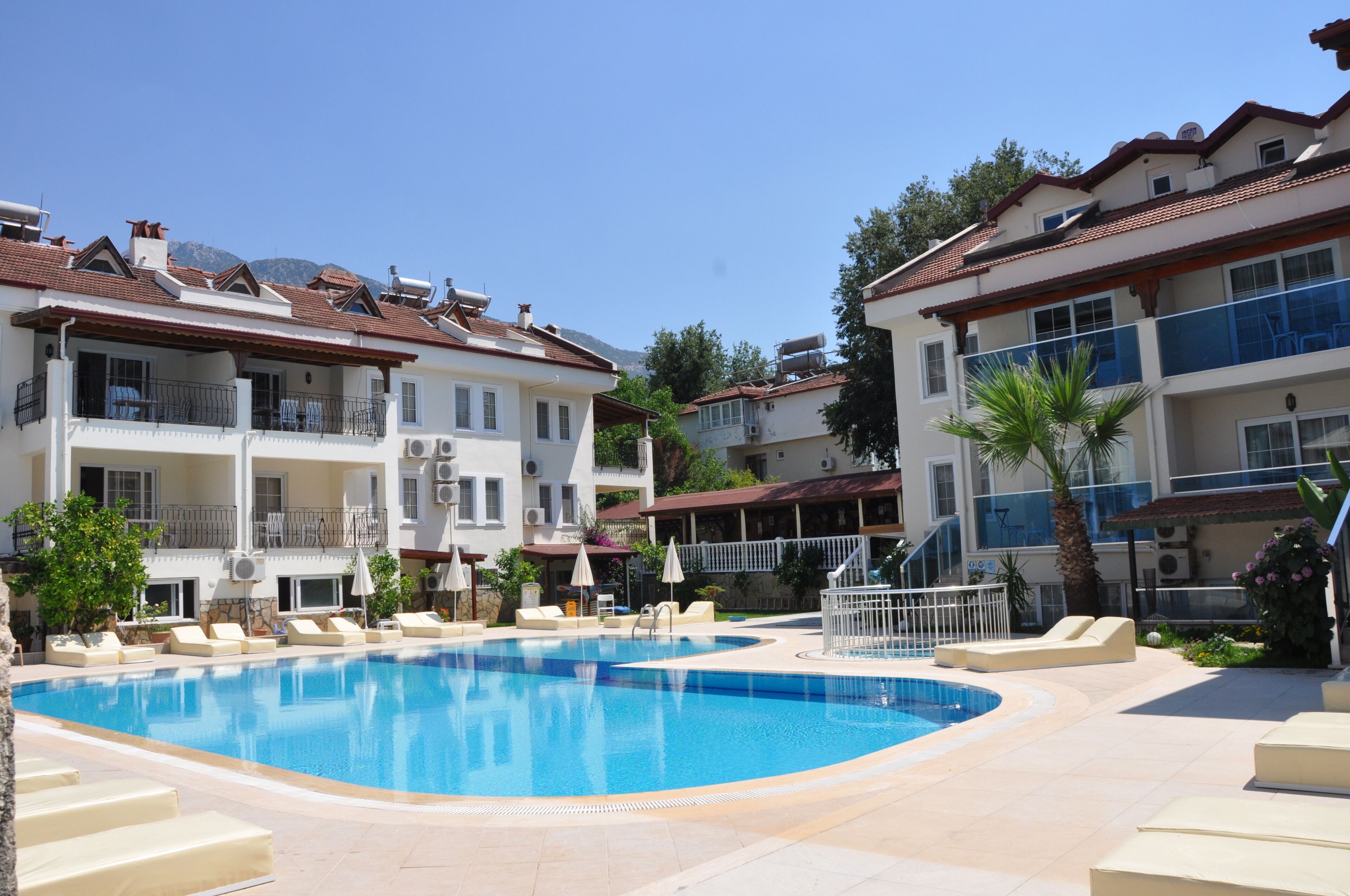 Seasonal outdoor pool, open 9:00 AM to 7:00 PM, sun loungers