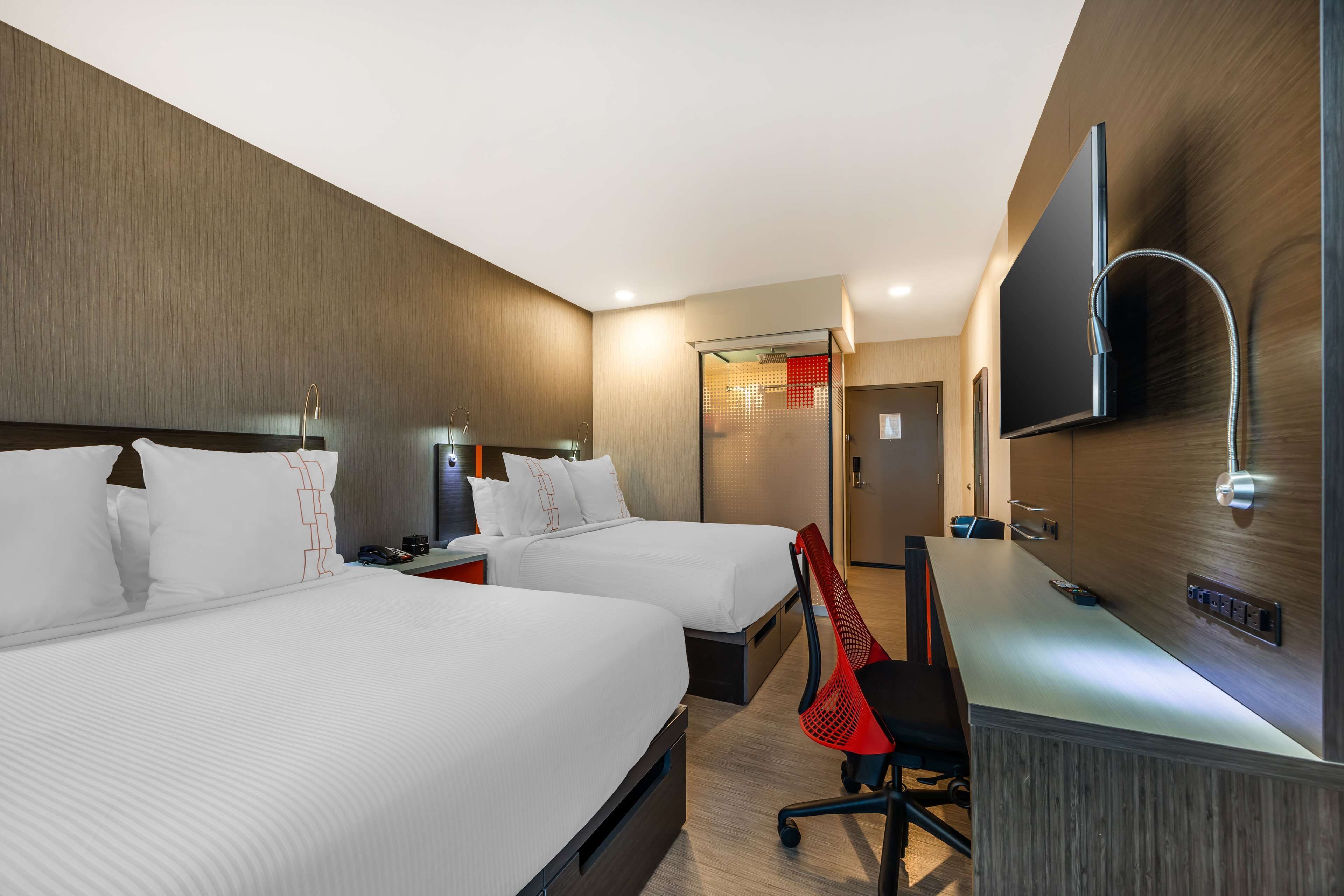 standard room, 2 queen beds, non smoking | premium bedding, in-room safe, blackout curtains, free wifi