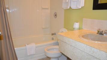 Combined shower/bathtub, deep-soaking bathtub, free toiletries, towels