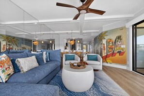 Téléviseur, table de baby-foot, table de ping-pong, livres