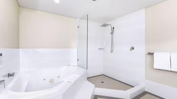 Shower, jetted bath, hair dryer, towels