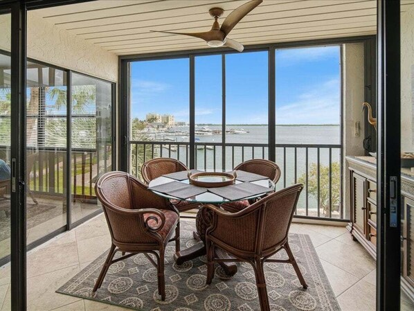Dining - Waterfront 2BR condo with pool, WiFi, and marina access in Marco Island. (Marco Island)