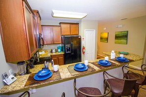 Fridge, microwave, oven, stovetop - Executive 5 Bed 4.5 Bath Vacation Home W/ Pool, Spa Near Disney  (Kissimmee)