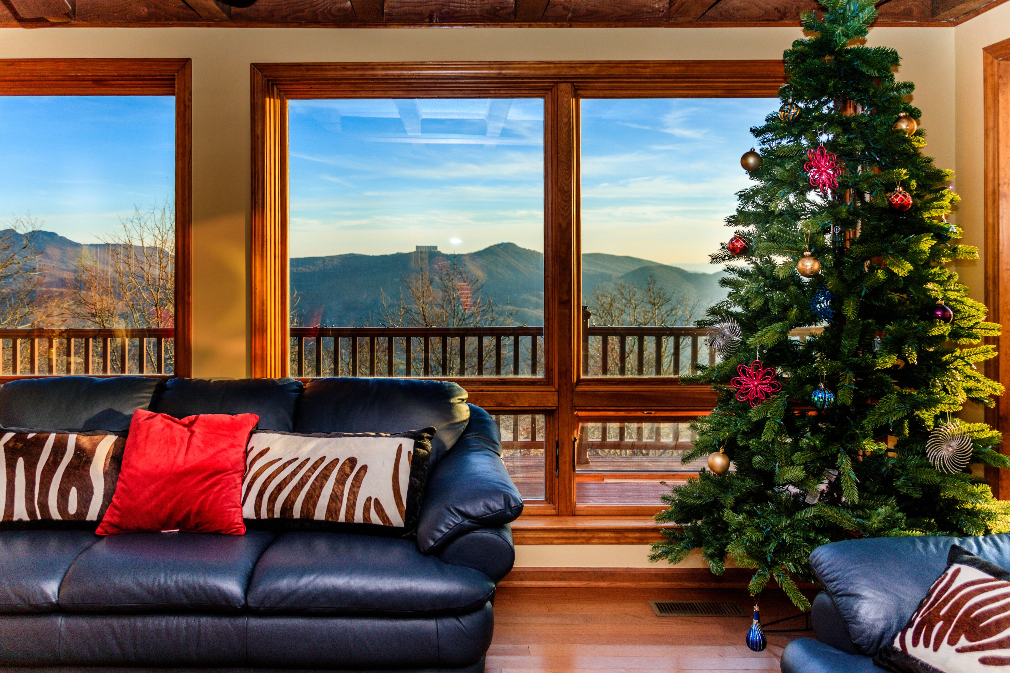 Living room with grandfather mountain and sugar ski resort view.