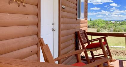 Cute private cabin on working cattle ranch with 360 views on 80 acres.