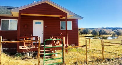 Cute private cabin on working cattle ranch with 360 views on 80 acres.