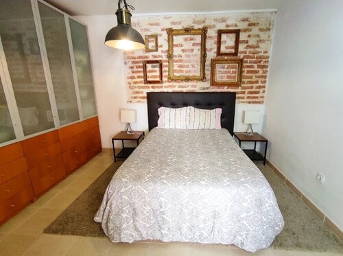 Brick wall old photographer patio house in Belem