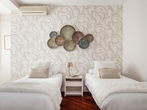 3 habitaciones, tabla de planchar con plancha y acceso a internet 
