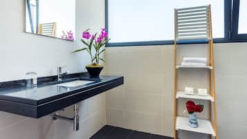 Bathtub, hair dryer, towels