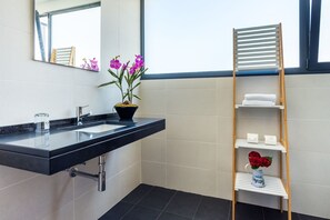 Bathtub, hair dryer, towels