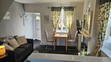 Smart TV, fireplace, books