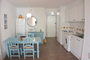 Fridge, microwave, coffee/tea maker, toaster