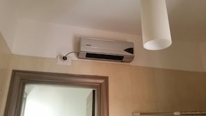 1 غرفة نوم ومكواة/لوح كي وواي فاي وملاءات أسرّة