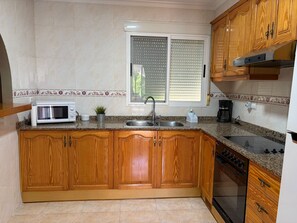 Fridge, microwave, oven, coffee/tea maker