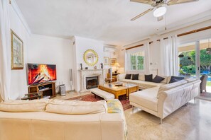 TV, fireplace, video games, DVD player - 1106 Luxurious Family Villa with Heated Pool (Estepona)