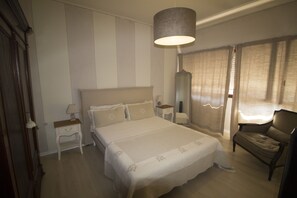 2 habitaciones, tabla de planchar con plancha, wifi y ropa de cama