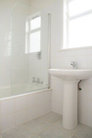 Olives At 45 | Bathroom | Combined shower/bathtub, deep-soaking bathtub, hair dryer, towels