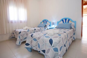 4 bedrooms, iron/ironing board, travel cot, WiFi