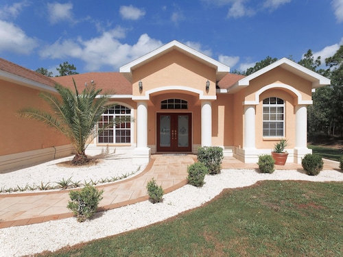 Paradise found! Private heated pool spa . 3700 sq ft of luxury on 2+ acres! 