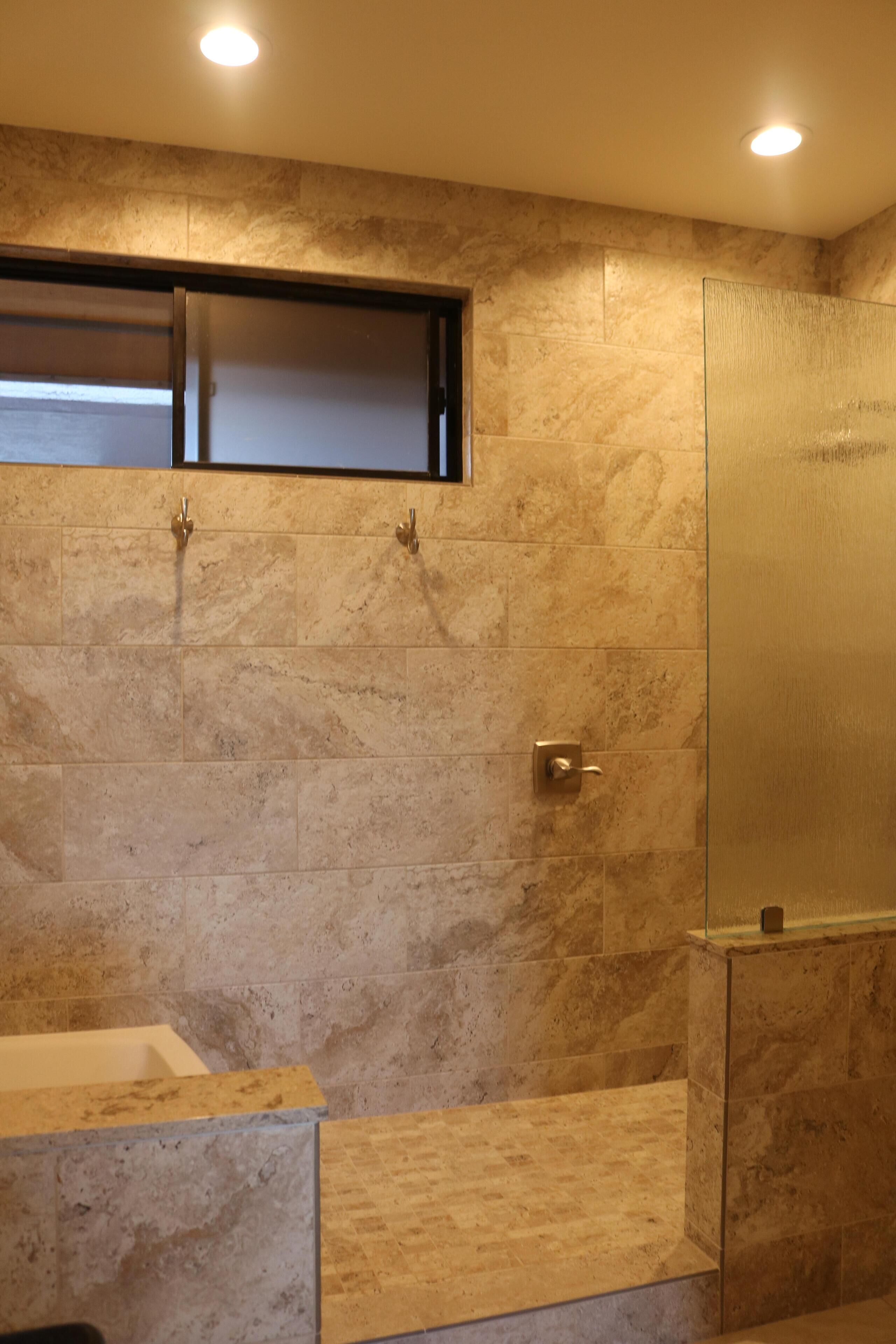 Bathtub, hair dryer, towels, soap