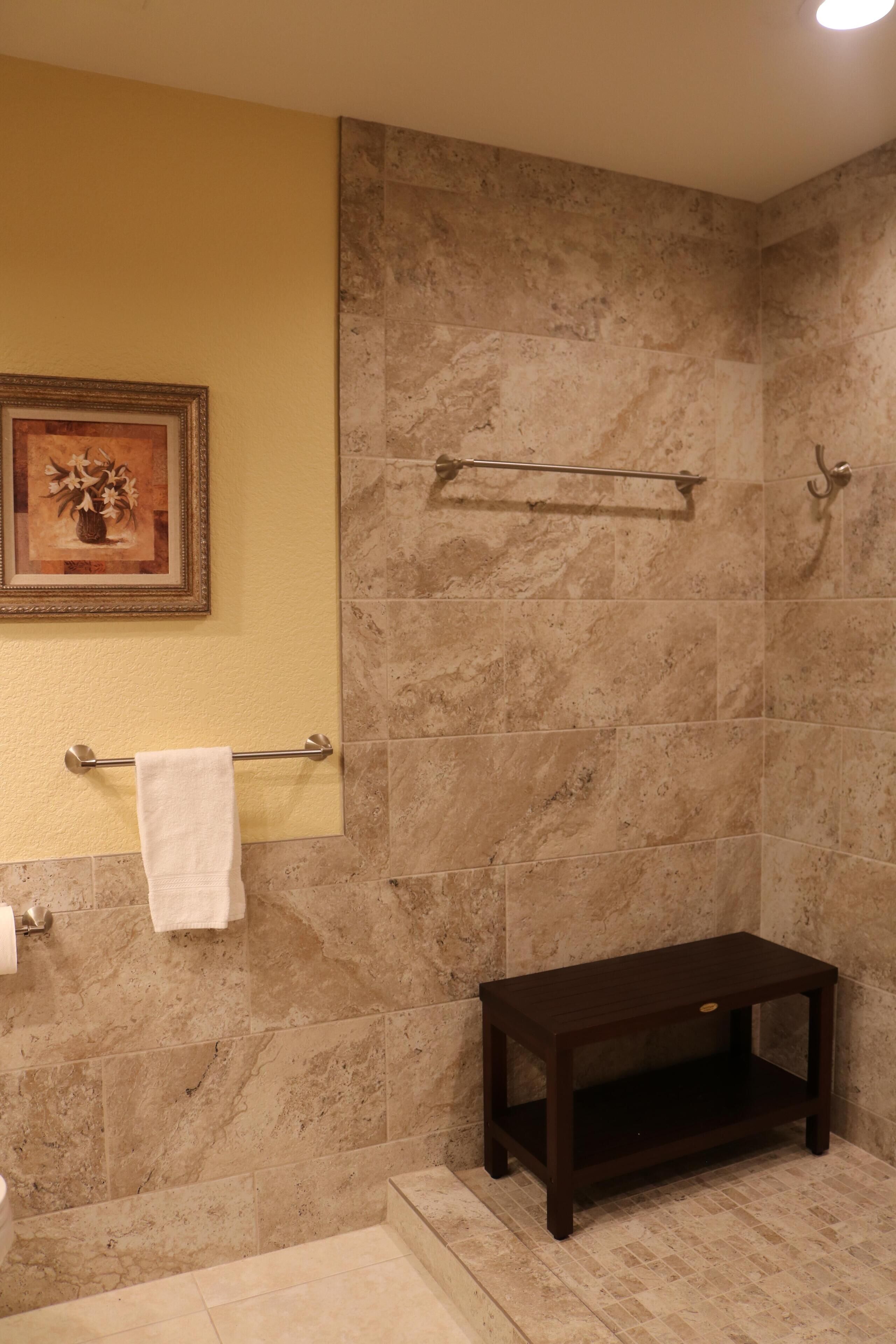 Bathtub, hair dryer, towels, soap