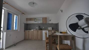 Fridge, stovetop, cookware/dishes/utensils