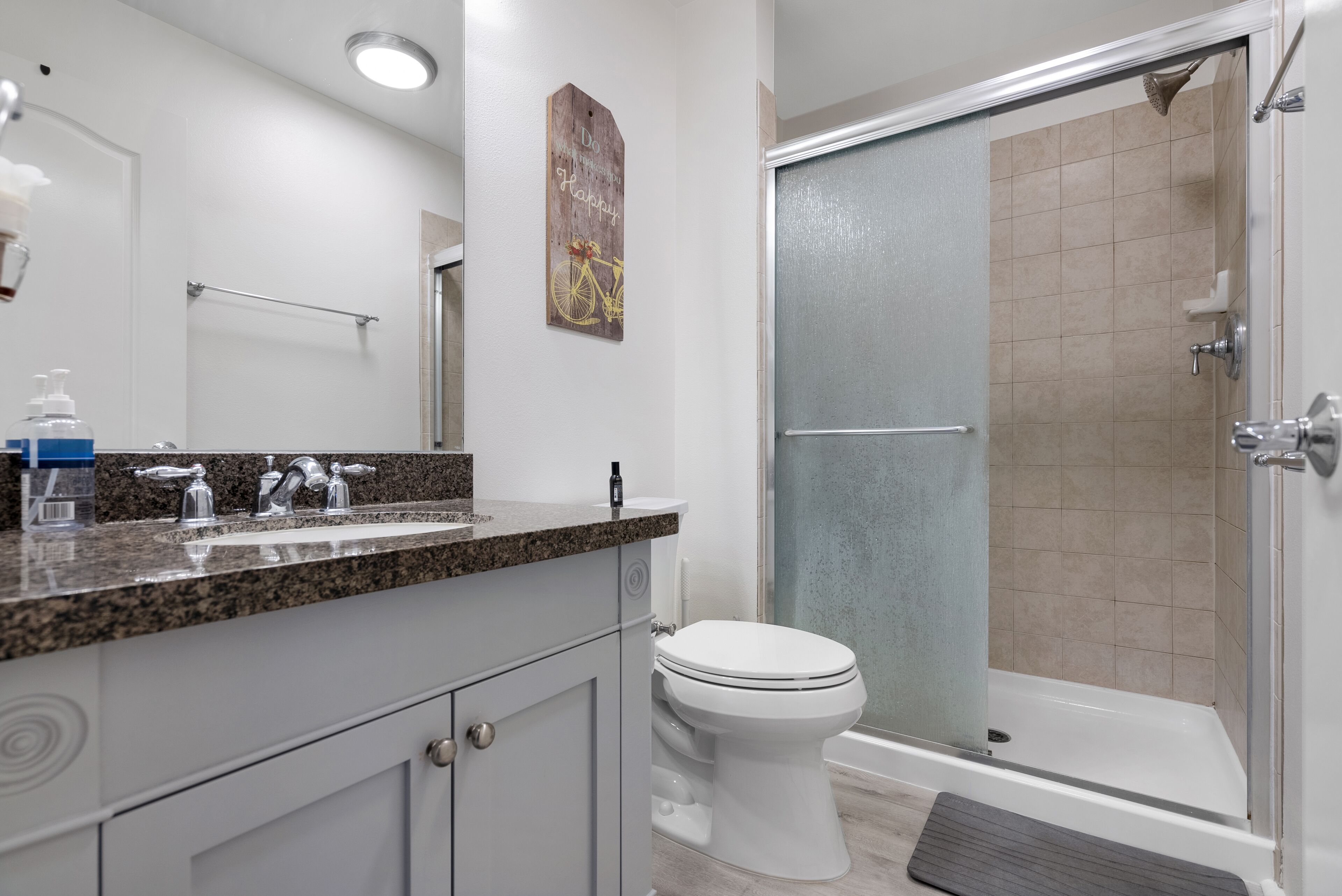 Shower, hair dryer, towels, toilet paper