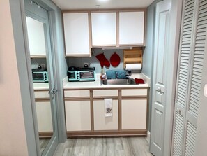 Fridge, microwave, coffee/tea maker, toaster