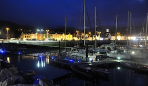 Marina and the house at night